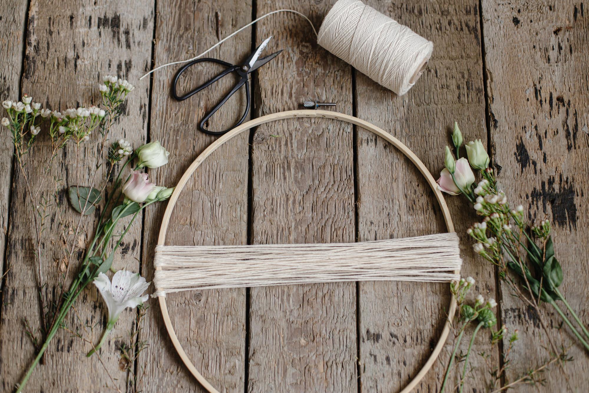 studio workspace with threads and hoops